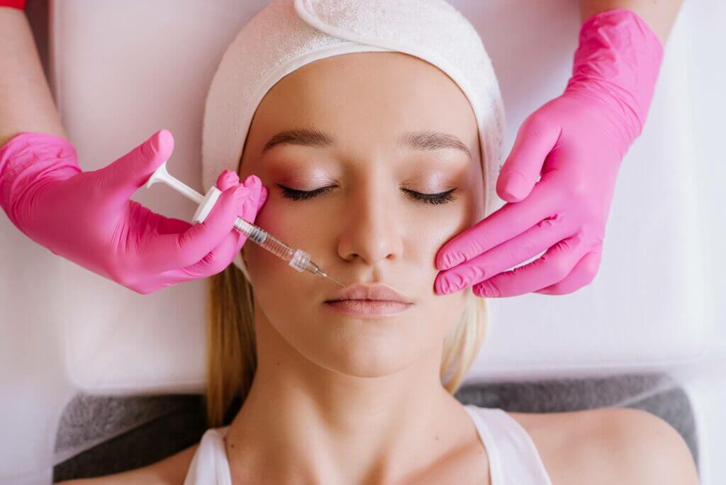 A Female getting injection on lips | Dermal Filler in Philadelphia, PA | PhillyMedClub