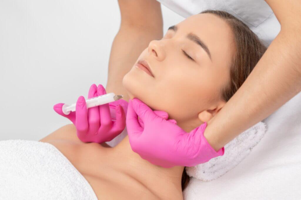 A Woman getting injection on chin | Kybella in Philadelphia, PA | PhillyMedClub