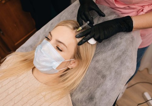 A blonde Woman getting injection on scalp | Hair Regenerative Medicine in Philadelphia, PA | PhillyMedClub