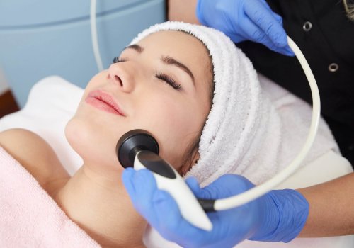 A Woman getting treatment on face by a device | Non-Invasive Skin Rejuvenation in Philadelphia, PA | PhillyMedClub